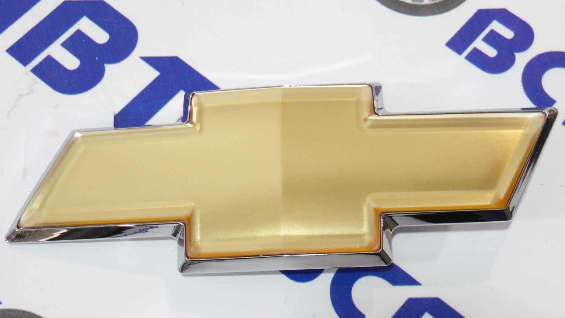 Эмблема крышки багажника Epica (крест) GM